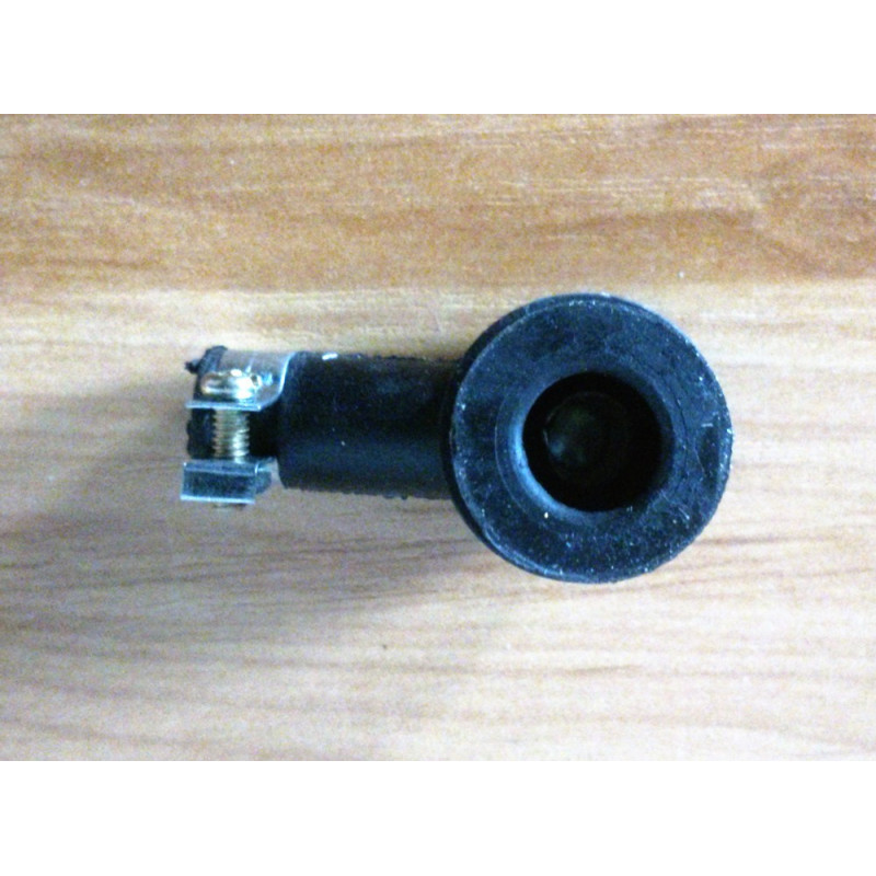 Rubber spark plug cap.