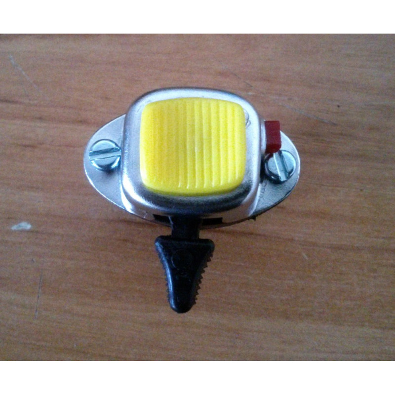 Llave de luces con boton de pare. Amarillo.