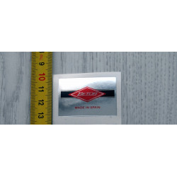 Adhesivo Betor cromado.