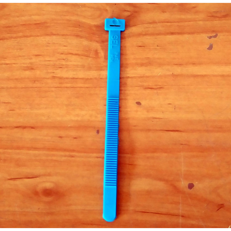 Flexible plastic clamp. Blue.