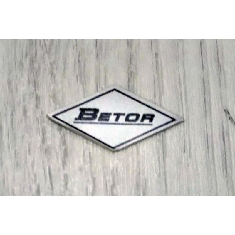 Adhesivo Betor plata.