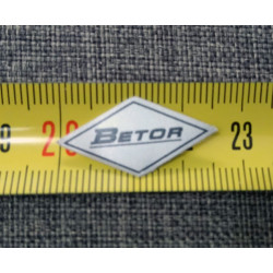 Adhesivo Betor plata.