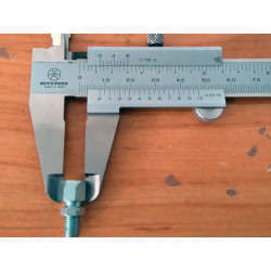 Tensioning screw cap carburetor.